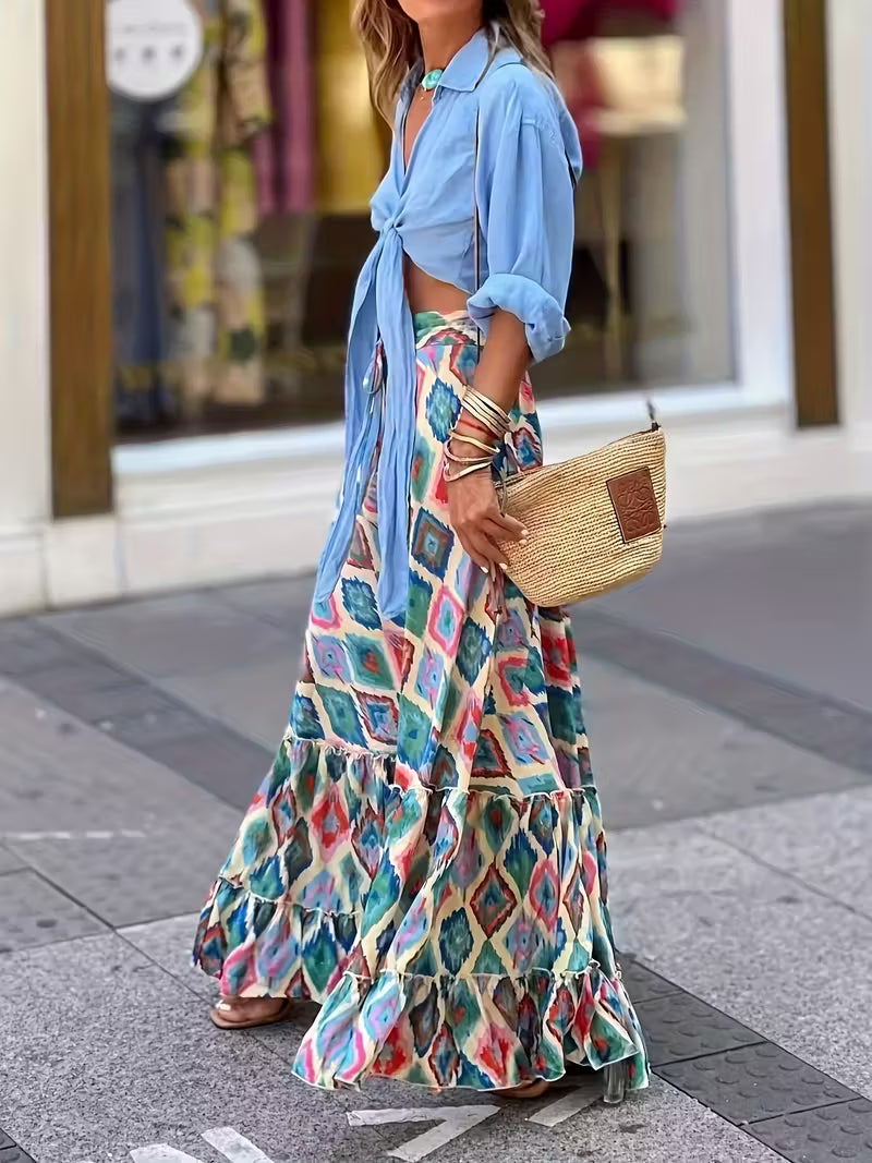 Jupe longue bohème imprimée, fluide et vibrante, qui booste instantanément votre style avec une allure chic, effortless et ultra tendance.