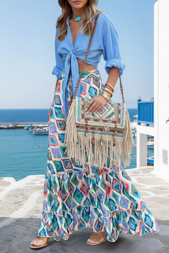Jupe longue bohème imprimée, fluide et vibrante, qui booste instantanément votre style avec une allure chic, effortless et ultra tendance.