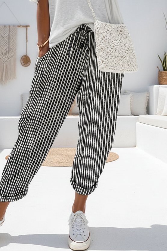 Pantalon large à rayures, taille haute avec lien noué, alliant confort décontracté et style ultra branché pour un look chic et moderne en toute simplicité