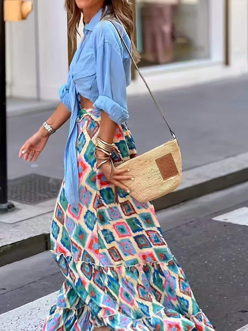 Jupe longue bohème imprimée, fluide et vibrante, qui booste instantanément votre style avec une allure chic, effortless et ultra tendance.
