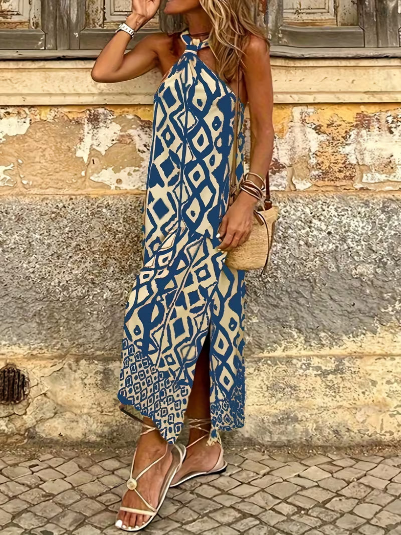 Robe longue raffinée à imprimé géométrique avec col halter, élégante et moderne, qui sublime la silhouette avec un style chic et résolument tendance
