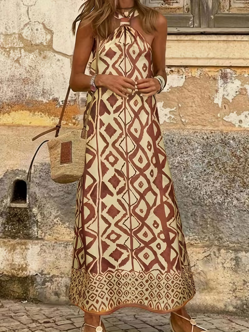 Robe longue raffinée à imprimé géométrique avec col halter, élégante et moderne, qui sublime la silhouette avec un style chic et résolument tendance
