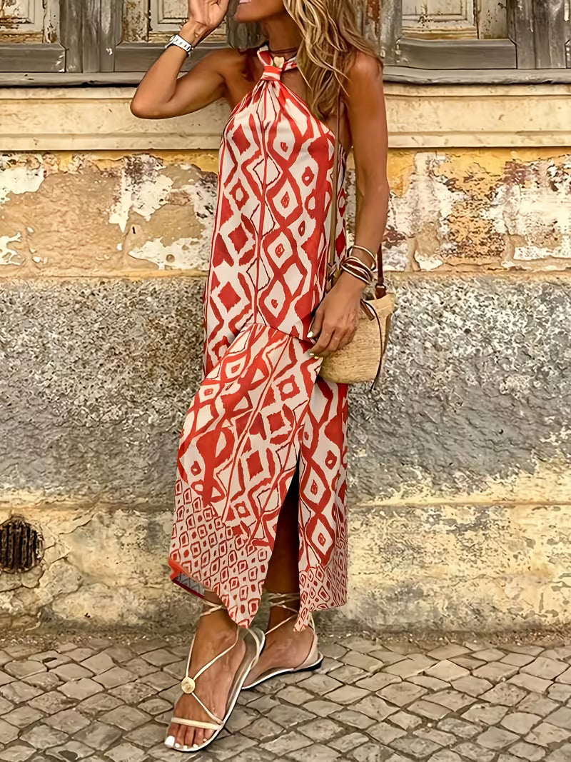Robe longue raffinée à imprimé géométrique avec col halter, élégante et moderne, qui sublime la silhouette avec un style chic et résolument tendance