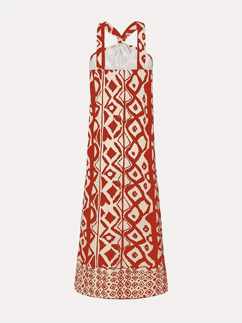 Robe longue raffinée à imprimé géométrique avec col halter, élégante et moderne, qui sublime la silhouette avec un style chic et résolument tendance