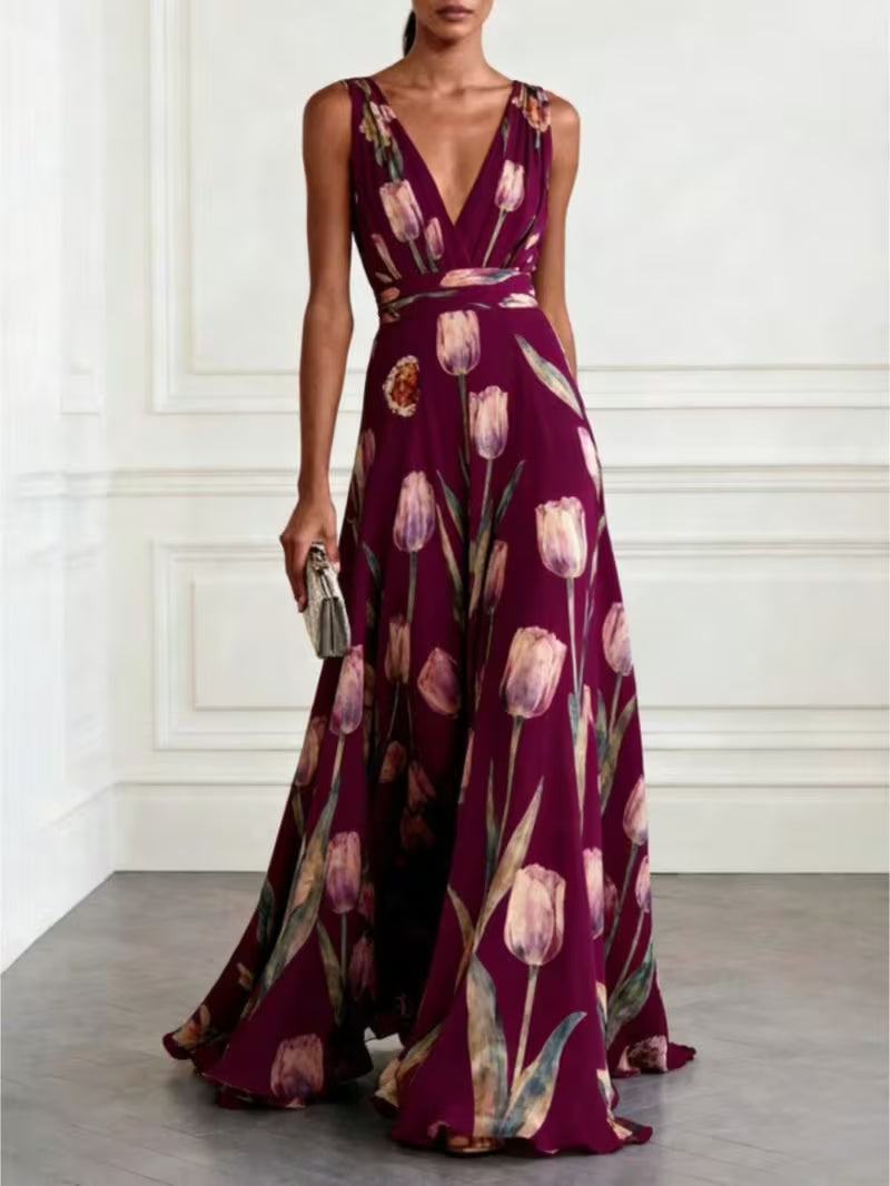 Robe de cocktail longue vaporeuse à imprimé tulipes, légère et élégante, qui sublime la silhouette avec une touche florale chic et une allure fluide irrésistiblement romantique